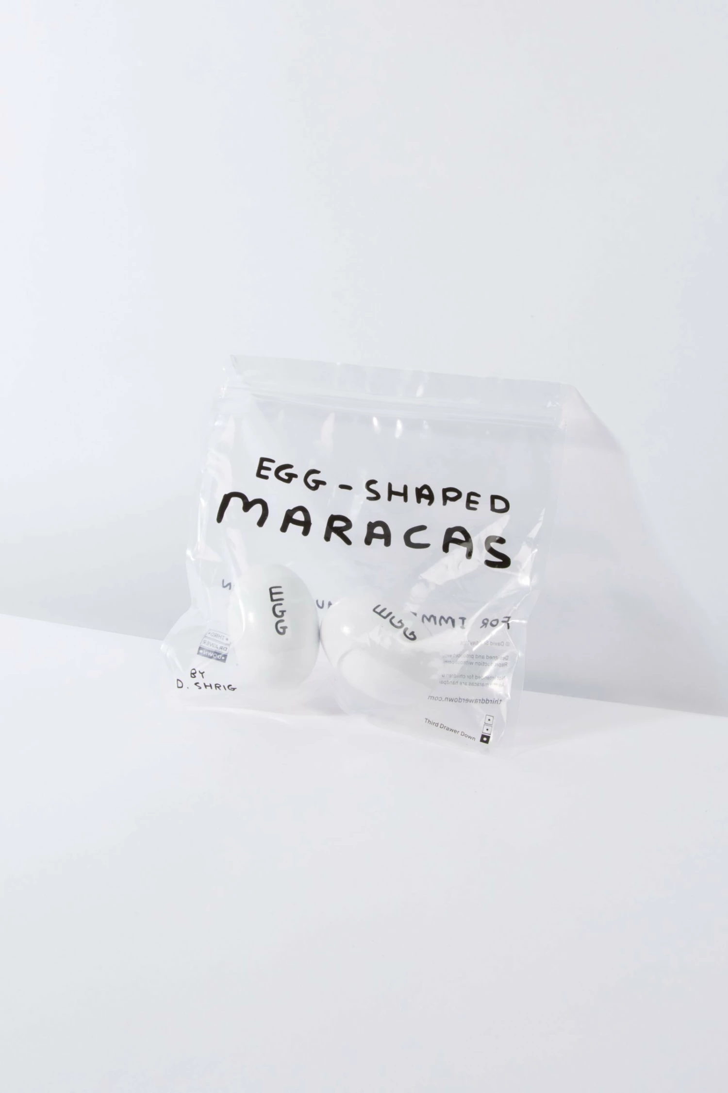 Third Drawer Down Egg-shaped Maracas - David Shrigley 1 Third Drawer Down Egg-shaped Maracas - David Shrigley